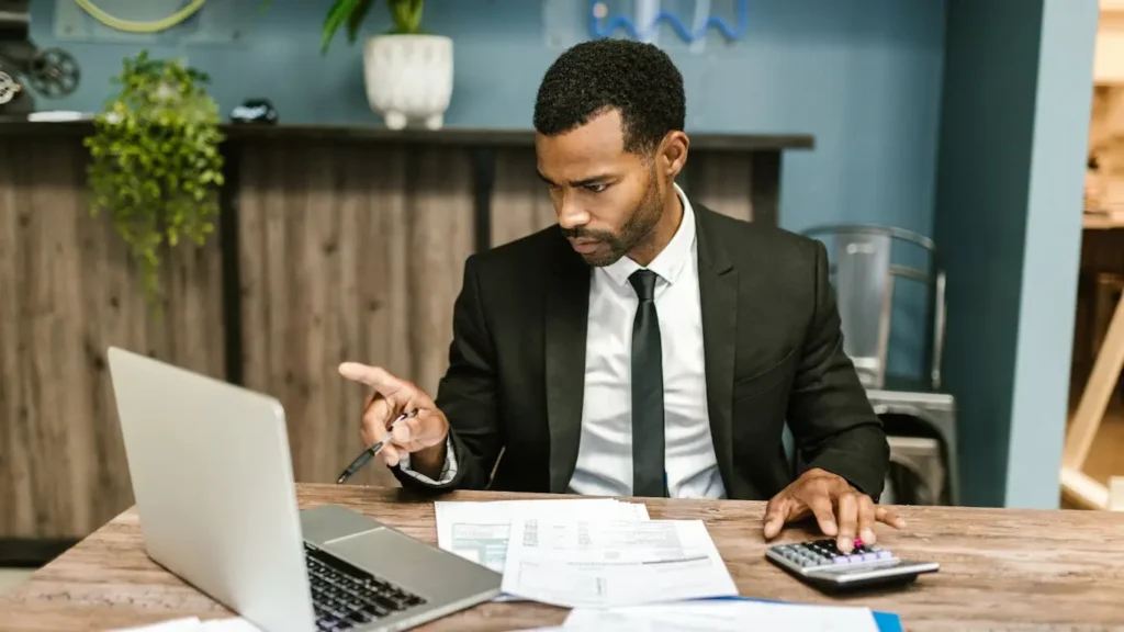 Businessman checking financial online documents